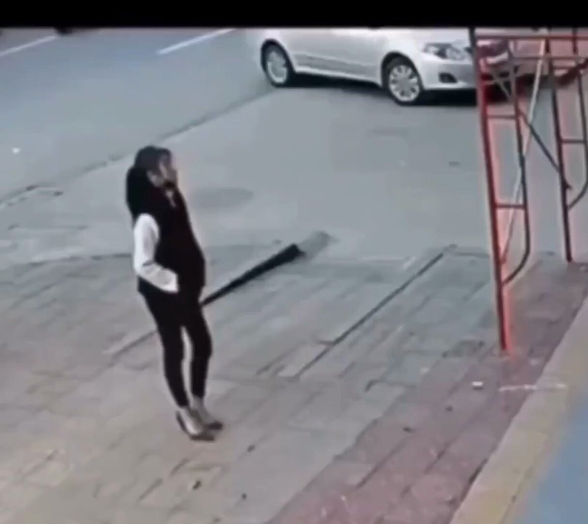 Woman saves man falling from height