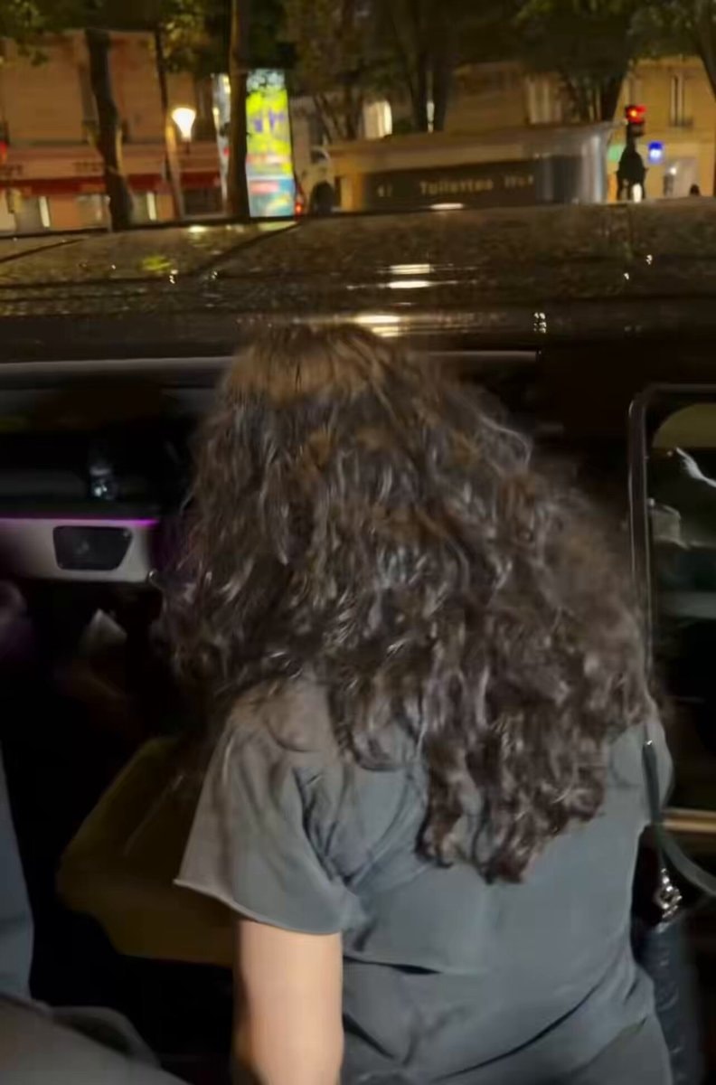 person getting into car at night person getting into car at night