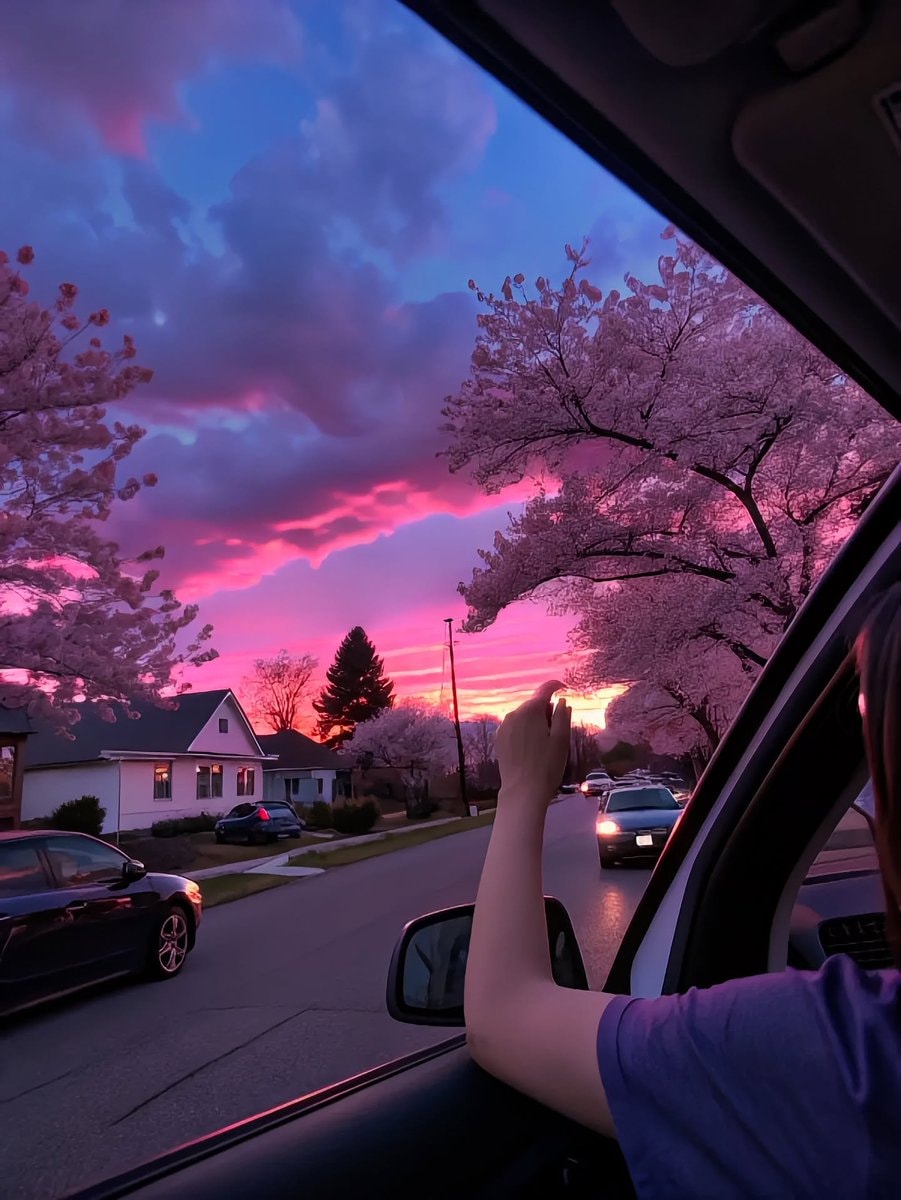 Sunset drive hand out the window