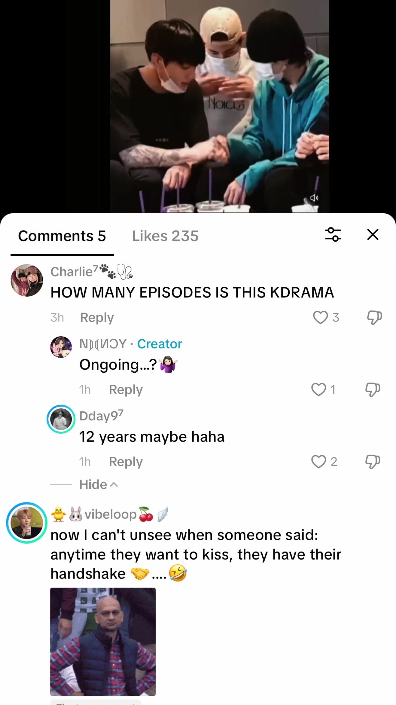 K-pop idols sitting together