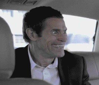 Willem Dafoe car grin
