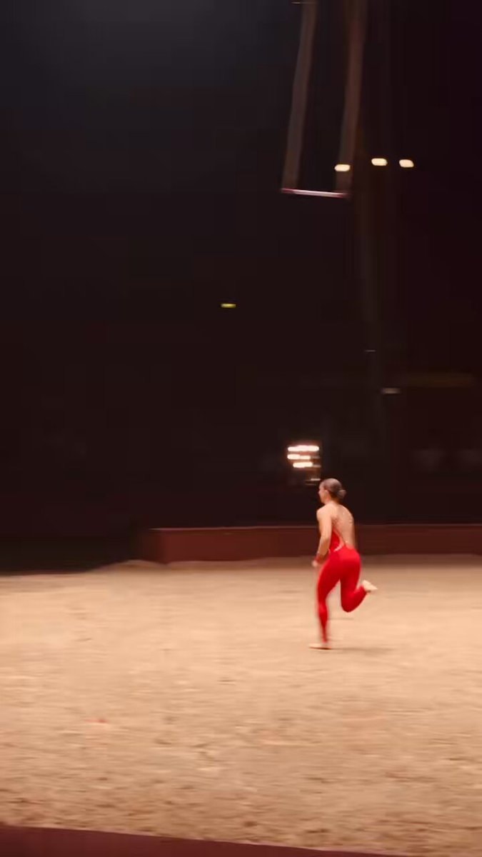 red leotard arena performance