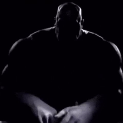 Thanos seated intense black and white