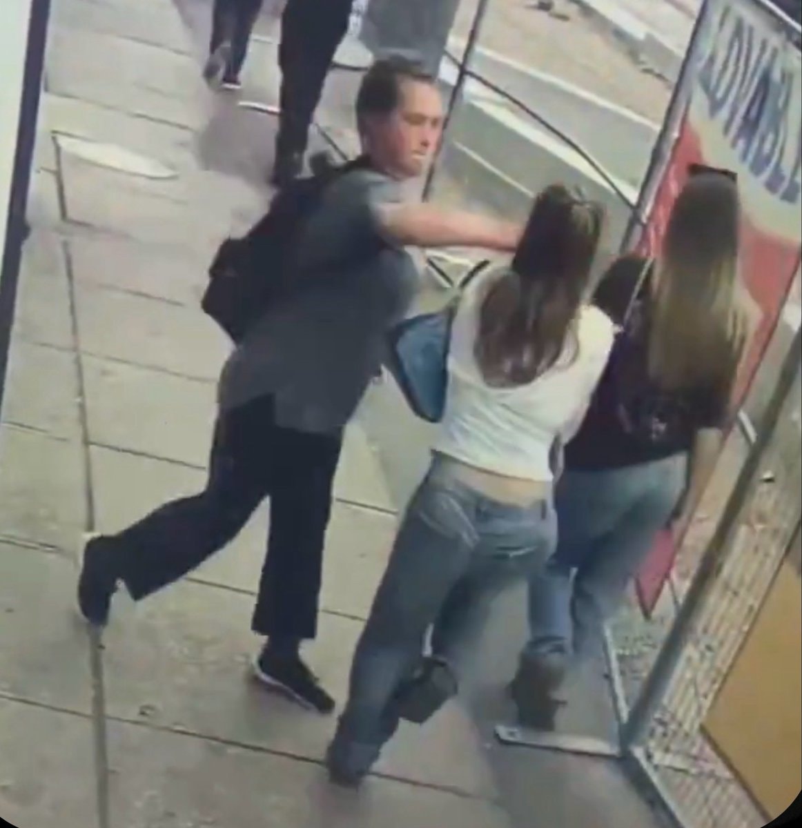 woman punching stranger street