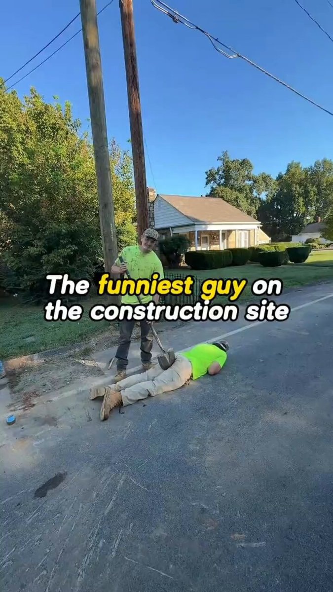 Construction workers joking on site