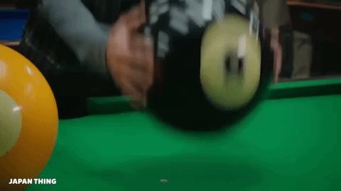 Billiards 8-ball shot on pool table