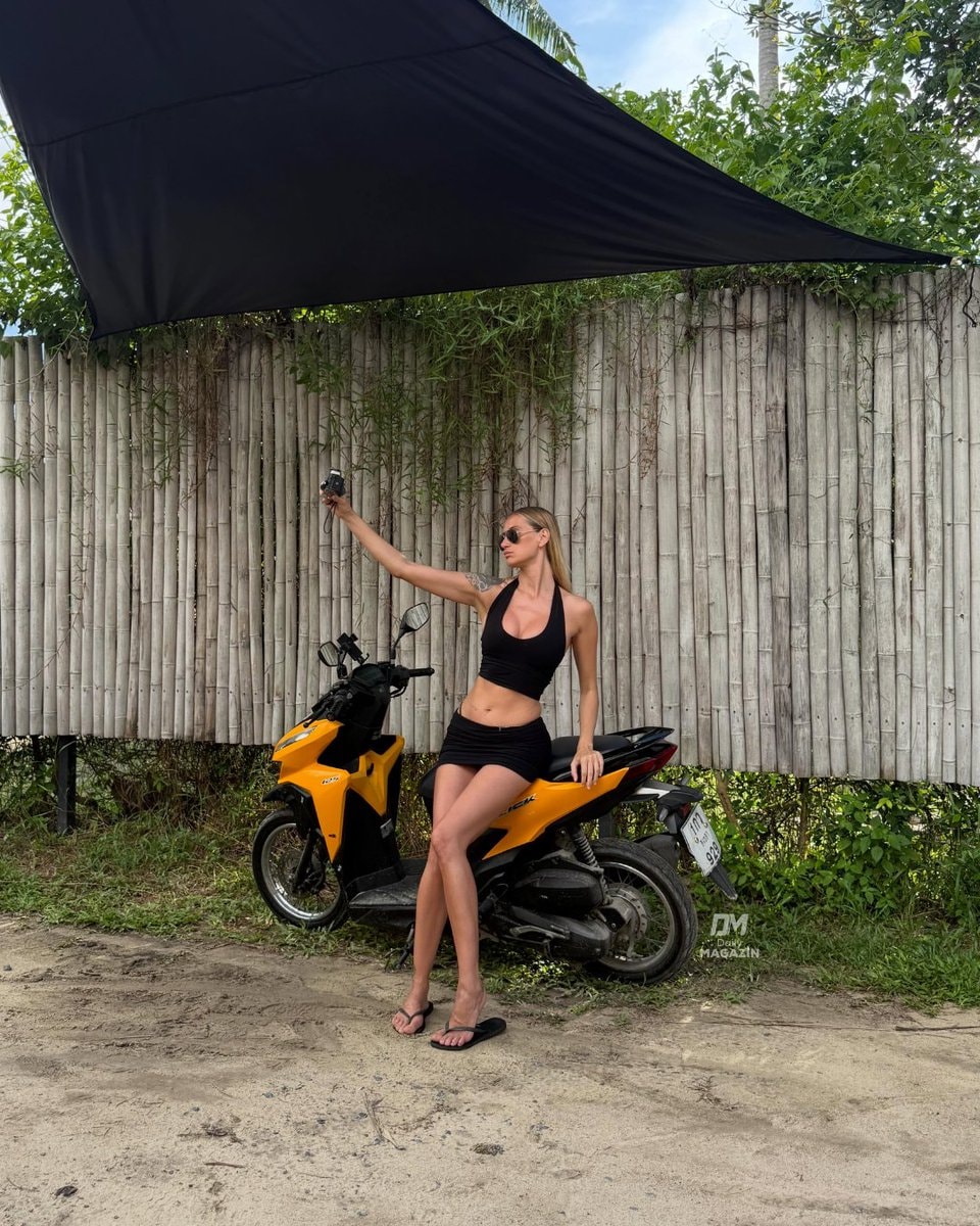Didem Soydan black suit pose