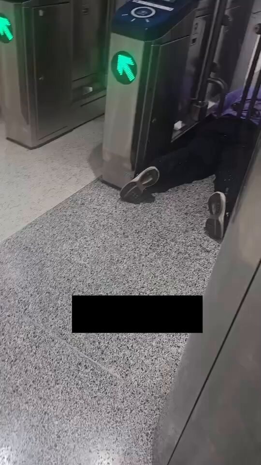 Crawling under a subway turnstile
