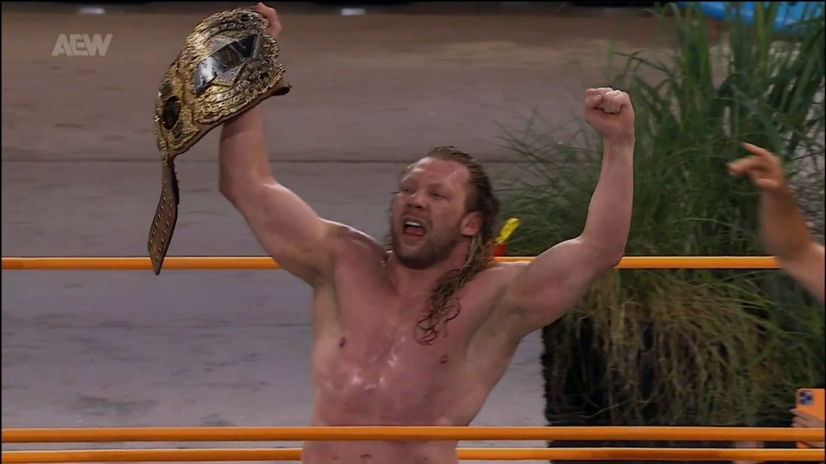 CM Punk and Kenny Omega WWE AEW Champions (photo 2 of 2)