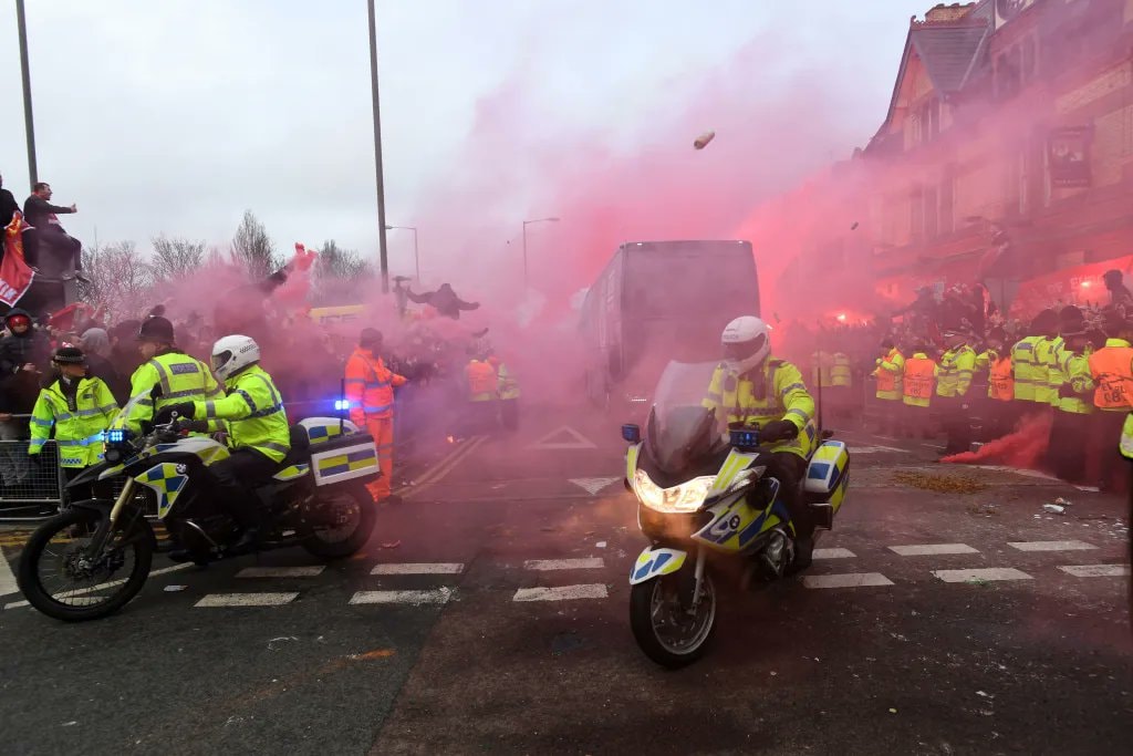Man City bus police escort at Anfield