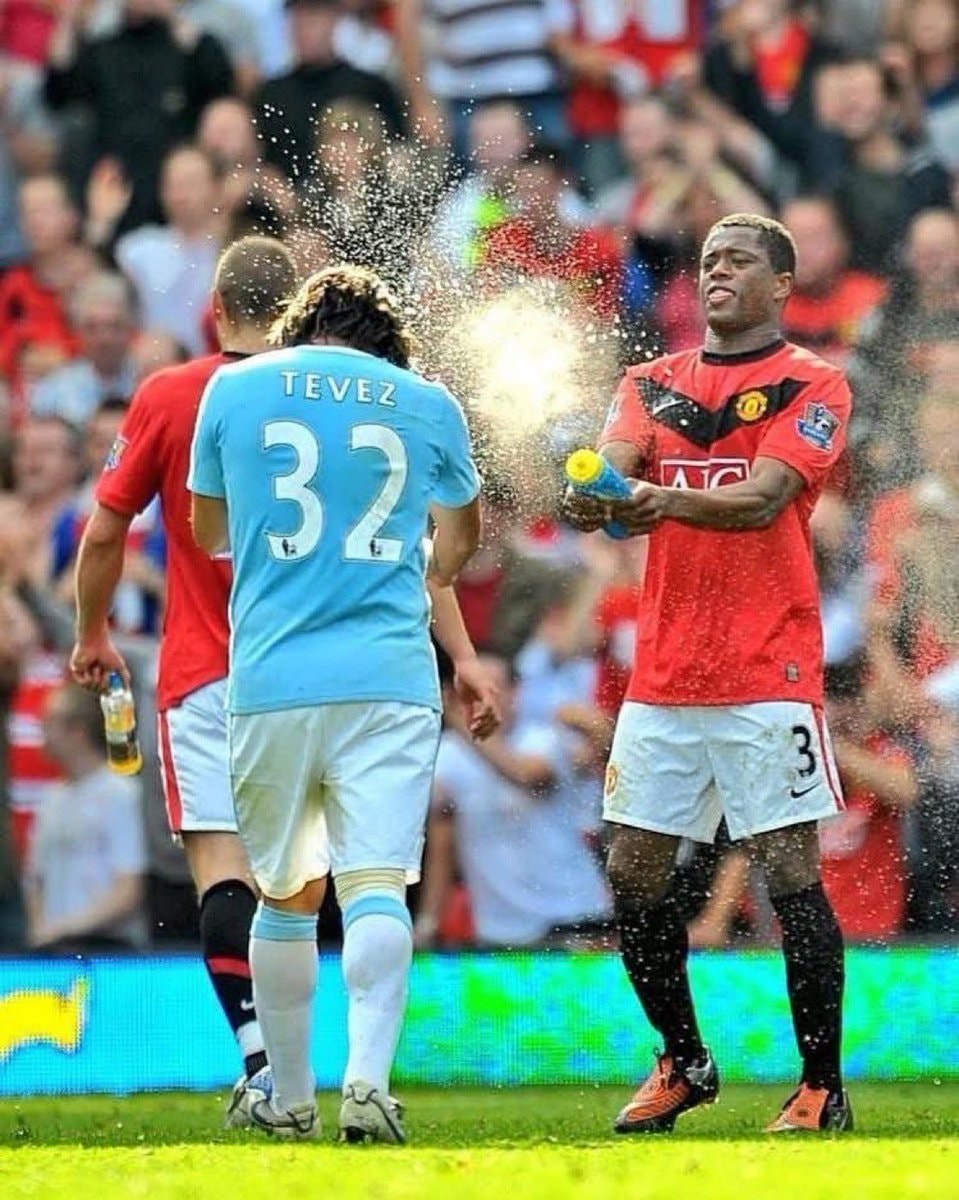 Patrice Evra Carlos Tevez Manchester City