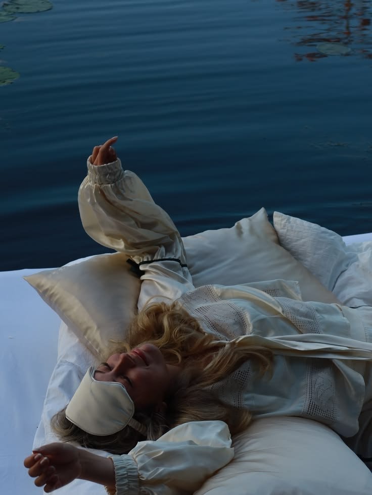 woman stretching on floating mattress (photo 4 of 4)