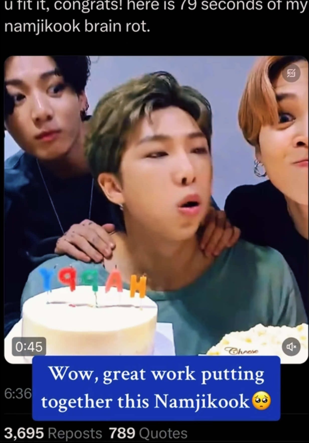 Three young men with a cake