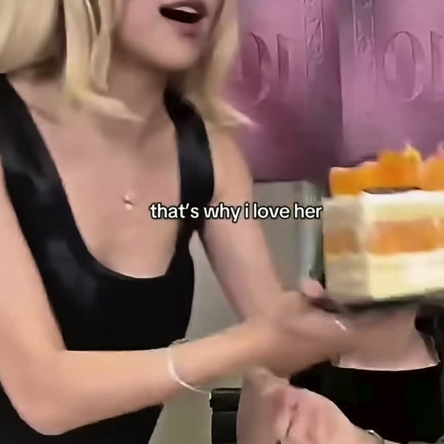 Rosé holding a cake Rosé holding a cake