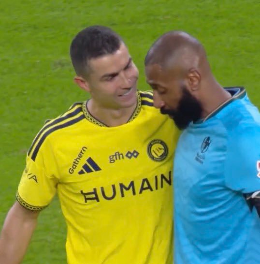 Waleed Abdullah soccer embrace (photo 2 of 2)