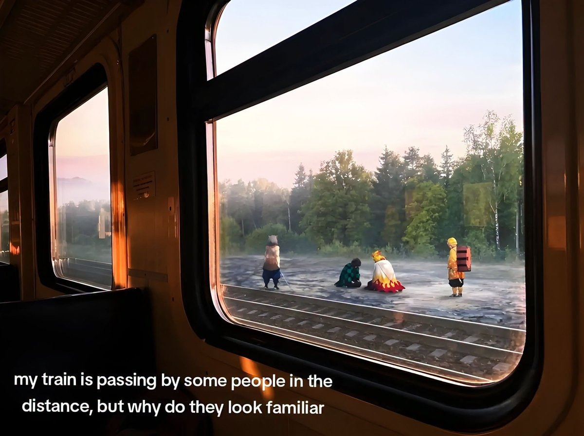 anime figures by train tracks