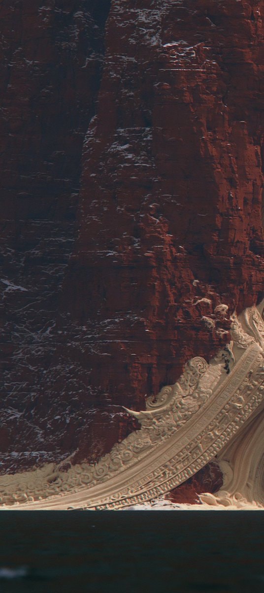 red rock formation with frost