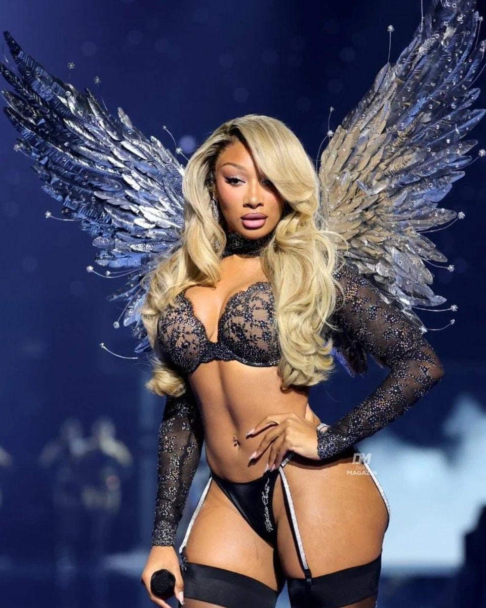 Megan Thee Stallion standing unaware Megan Thee Stallion standing unaware