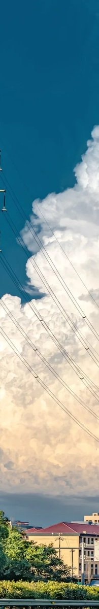 dramatic sky with fluffy clouds