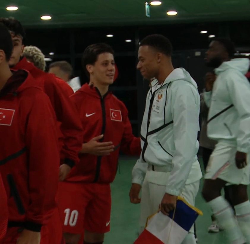 Soccer players passing moment
