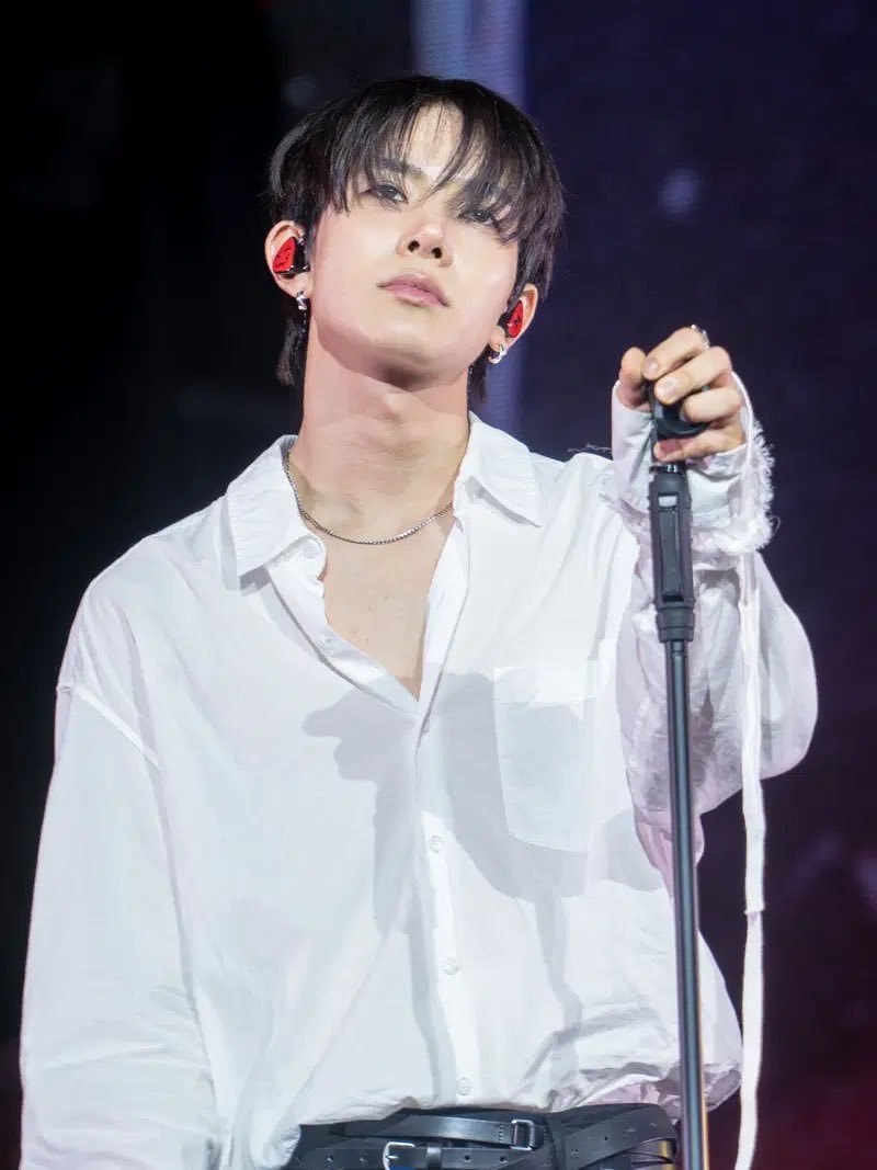 EVAN stage performance with white shirt