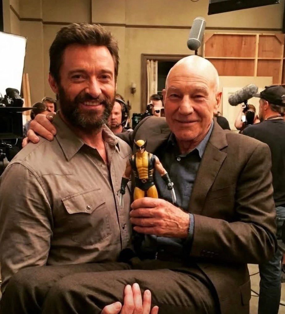 Hugh Jackman and Sir Patrick Stewart holding Wolverine