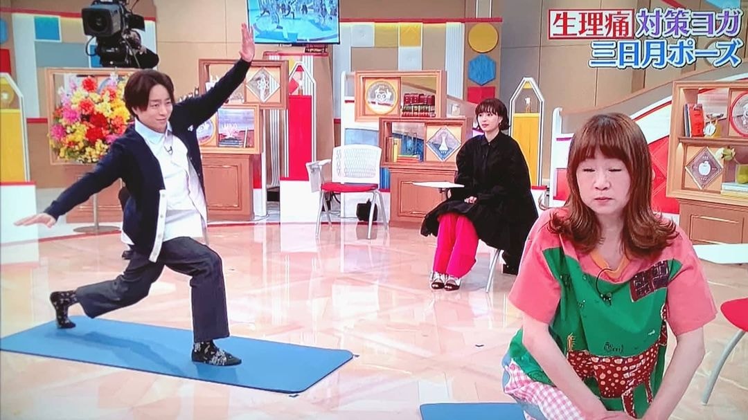 Yoga pose on blue mat
