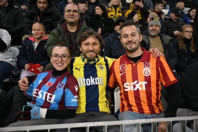 Friends at a sporting event in Finland