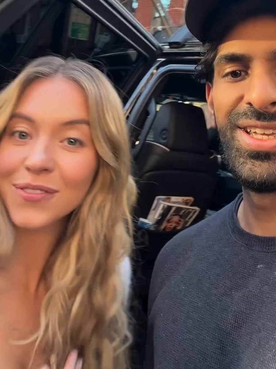 Sydney Sweeney with a fan