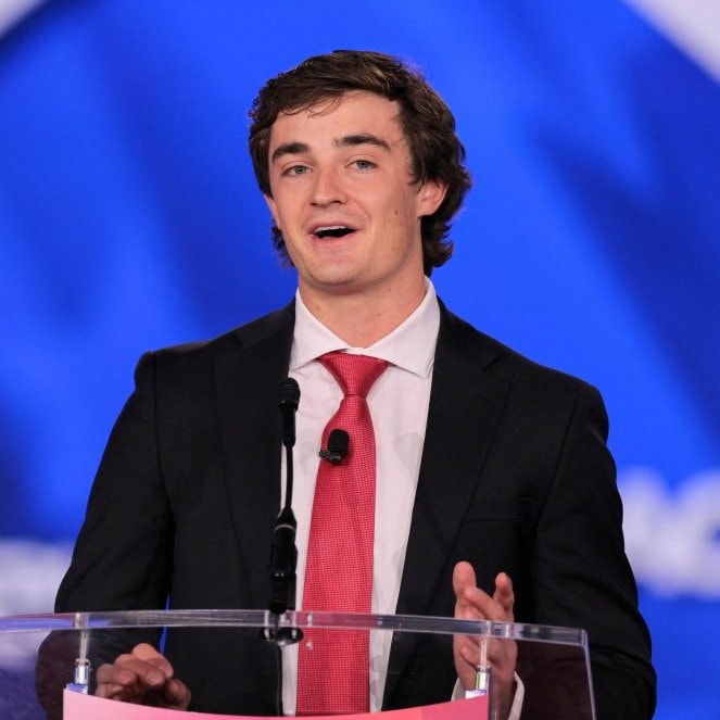 Nick Shirley speaks at podium