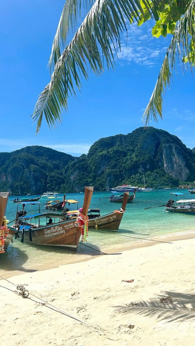 Thailand longtail boats turquoise water (photo 4 of 4)