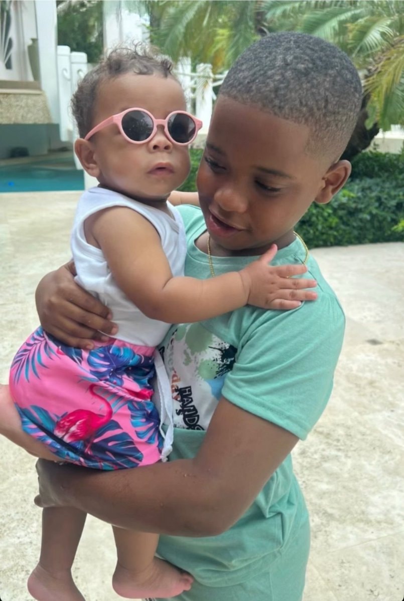 baby in pink sunglasses