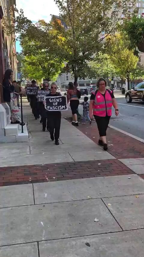 USAID cuts silent march signs