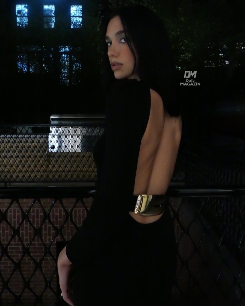 Dua Lipa black dress look