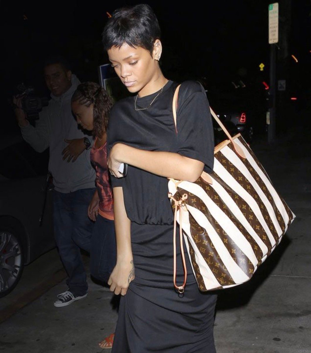 Rihanna hiding in a bag (photo 2 of 2)