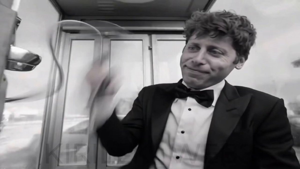 Sam Altman in a phone booth
