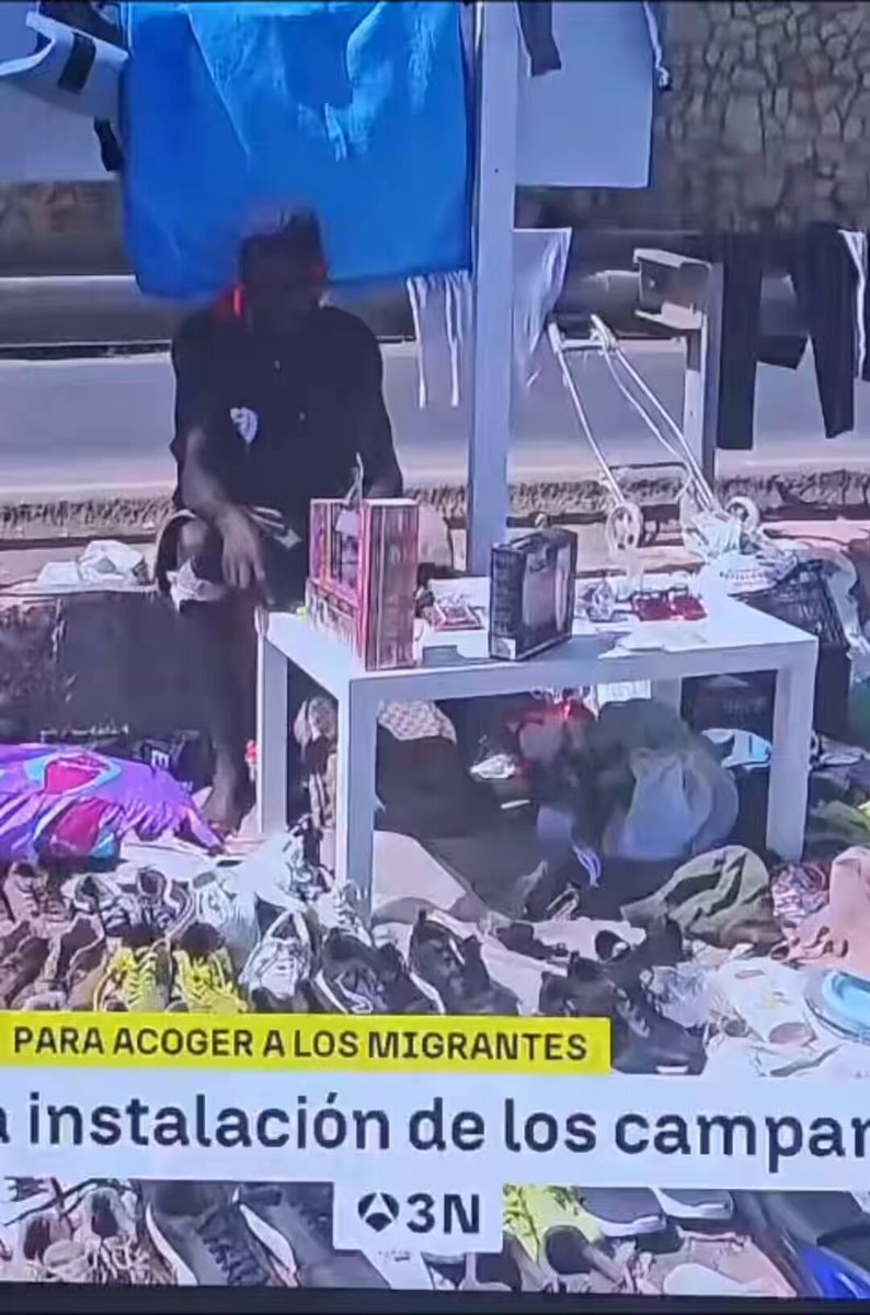 migrants selling fake gucci shoes in ceuta