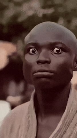 Boy surprised reaction GIF