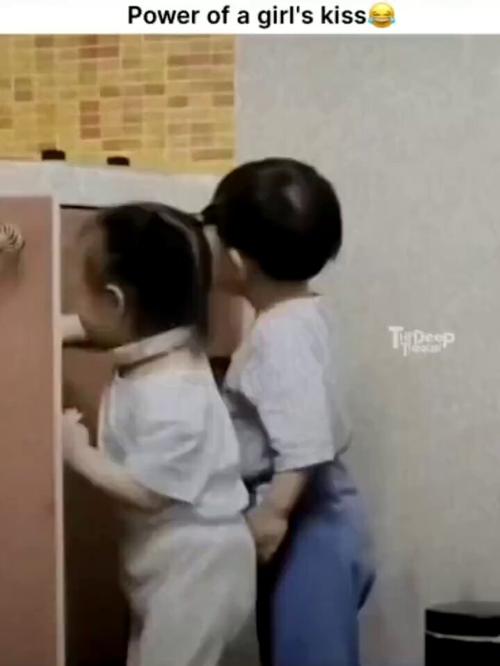 Toddler kitchen moment Power of a girl's kiss