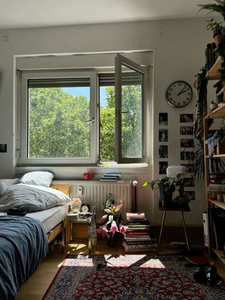 cozy bedroom with lilies (photo 1 of 4)