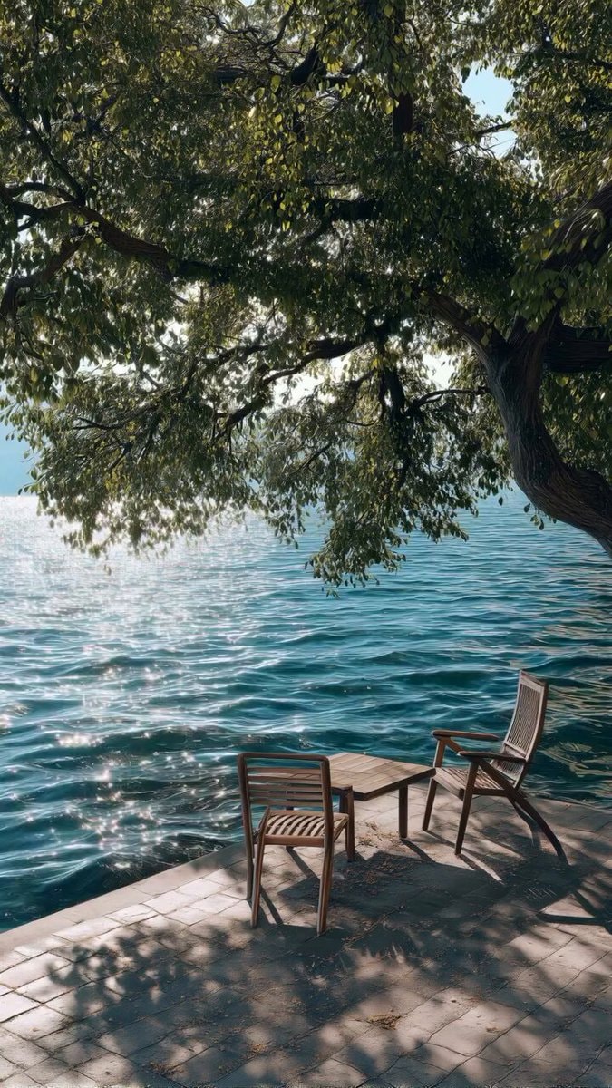outdoor table by blue water