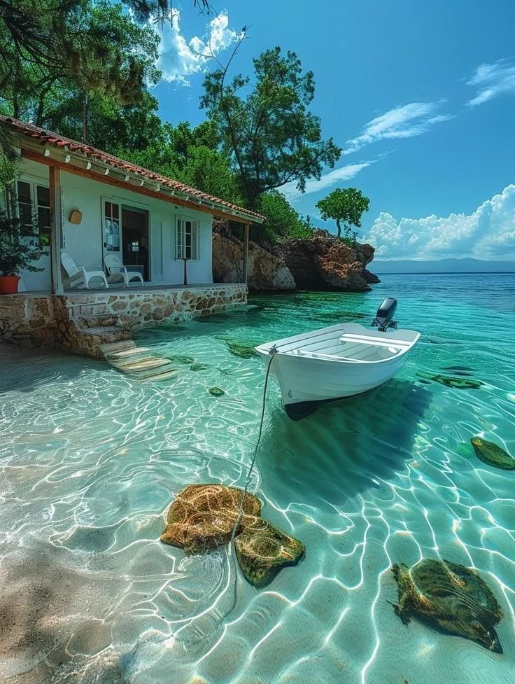white boat turquoise water