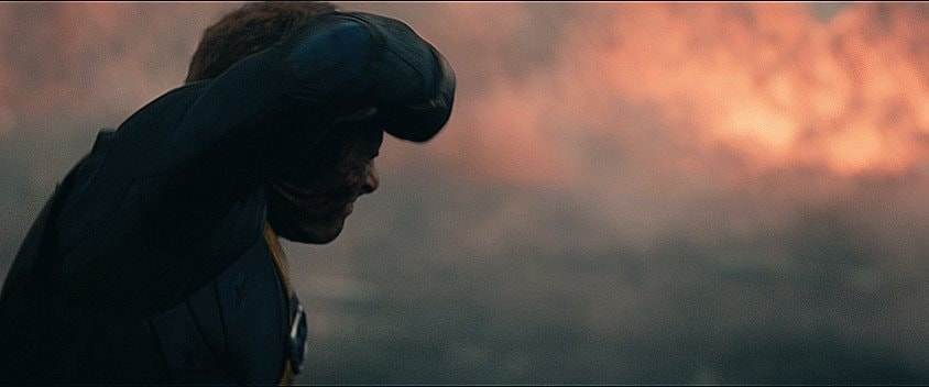 uniformed person struggling in storm