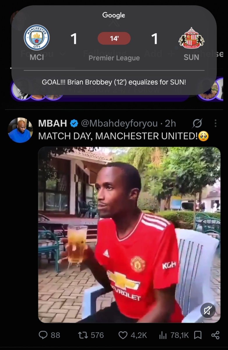 man in Manchester United jersey