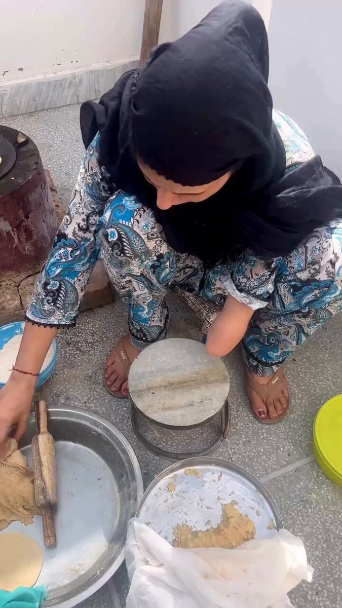 Woman preparing flatbread dough
