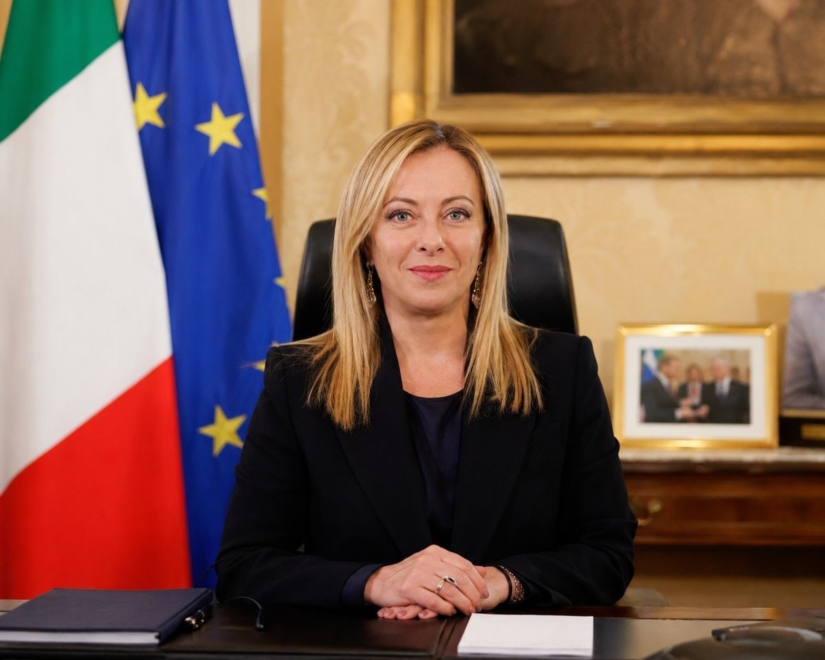 Giorgia Meloni at desk
