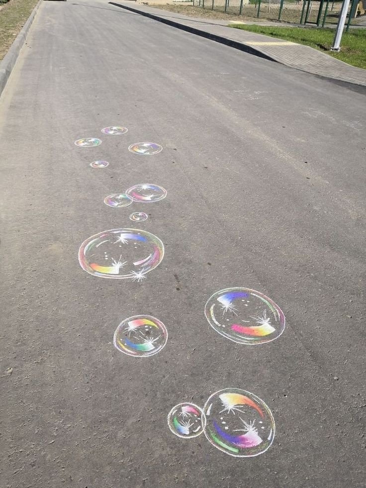 Chalk bubble art on pavement (photo 2 of 2)