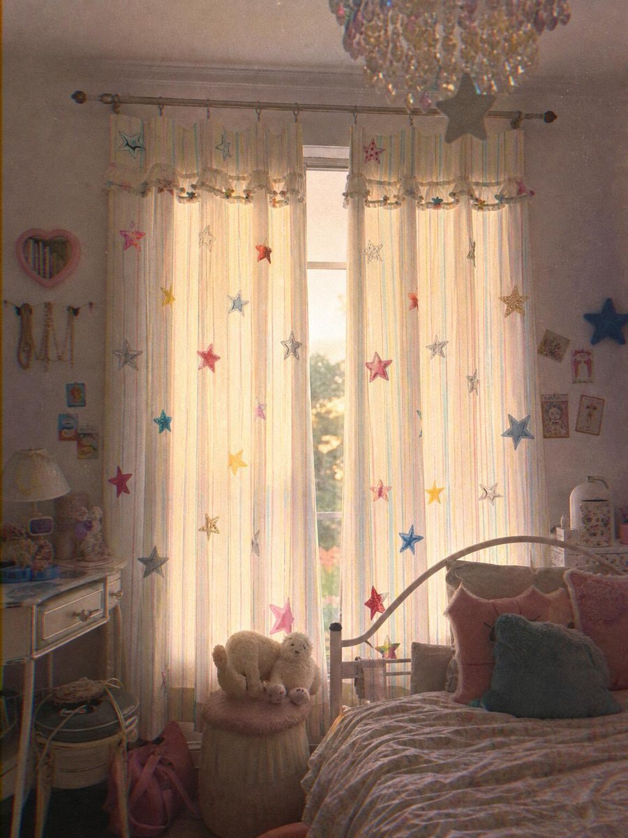 cozy bedroom with star curtains (photo 2 of 4)