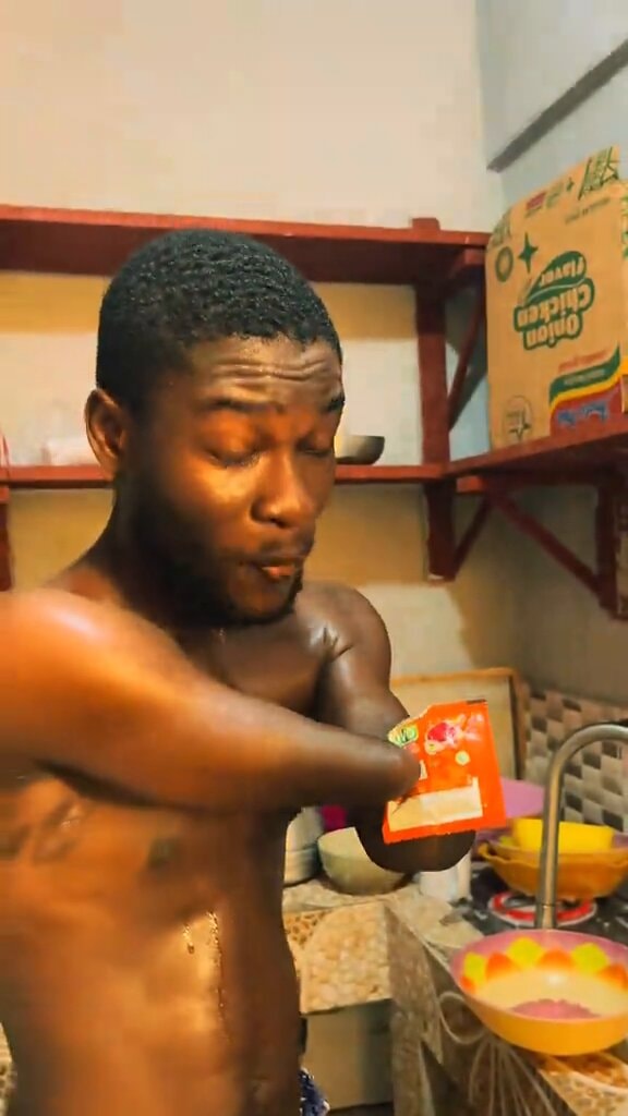 man turns on stove
