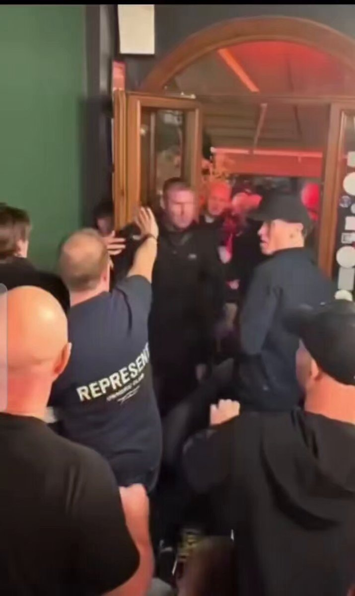 Manchester United fans clash in Como bar